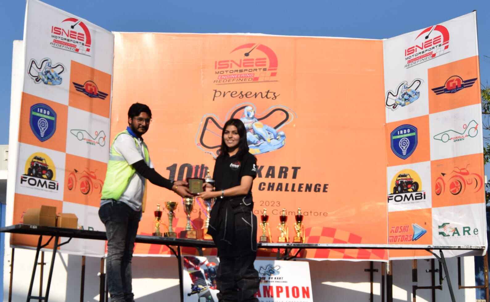 Team celebrating at 10th GKDC 2023 with trophies